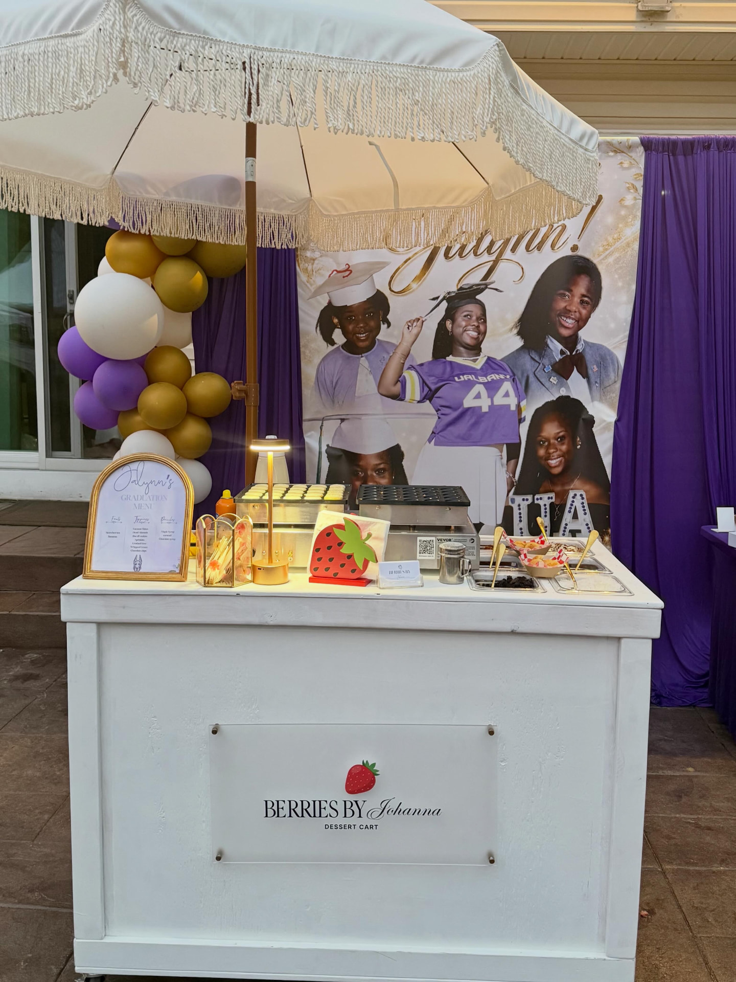 Berries by Johanna dessert cart styled for a graduation party